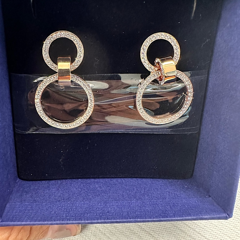 Swarovski Diamond earrings.